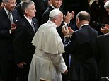 Pope Francis is applauded as he arrives to on Capitol Hill in Washington, Thursday, Sept. 24, 2015, to address a joint meeting of Congress. Watching, in the front row, from left are, Supreme Court Justice Sonia Sotomayor, Ruth Bader Ginsburg, Anthony Kennedy, Chief Justice John Roberts and Secretary of State John Kerry. (AP Photo/Pablo Martinez Monsivais)