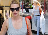 UK CLIENTS MUST CREDIT: AKM-GSI ONLY
EXCLUSIVE: West Hollywood, CA - Blonde beauty January Jones looks happy after getting some retail shopping done at Zimmermann Melrose Place.

Pictured: January Jones
Ref: SPL1135207  230915   EXCLUSIVE
Picture by: AKM-GSI / Splash News