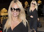 Pamela Anderson is all smiles as she arrives at her hotel in Berlin with one of her German managers Florian Wess. She is in Berlin to promote her new book.

Pictured: Pamela Anderson
Ref: SPL1133964  240915  
Picture by: Splash News

Splash News and Pictures
Los Angeles: 310-821-2666
New York: 212-619-2666
London: 870-934-2666
photodesk@splashnews.com
