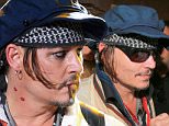 Rio de Janeiro, Brazil - Part 2 - After performing during Rock in Rio with his superband 'Hollywood Vampires' Johnny Depp and his pretty wife Amber Heard braved the crowd as they exited the venue. Depp waved to his fans and shared his unique style with our lenses.\nAKM-GSI         September  24, 2015\n \n To License These Photos, Please Contact :\n \n Steve Ginsburg\n (310) 505-8447\n (323) 423-9397\n steve@akmgsi.com\n sales@akmgsi.com\n \n or\n \n Maria Buda\n (917) 242-1505\n mbuda@akmgsi.com\n ginsburgspalyinc@gmail.com