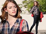 142904, EXCLUSIVE: Emma Stone seen filming on the set of her upcoming movie 'La La Land' in Pasadena. The actress talks on the cellphone as she enters her Prius car. Pasadena, California - Thursday September 24, 2015. Photograph: Miguel Aguilar, © PacificCoastNews. Los Angeles Office: +1 310.822.0419 sales@pacificcoastnews.com FEE MUST BE AGREED PRIOR TO USAGE