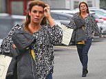 WAG COLEEN ROONEY HIDING HER GROWING BABY BUMP WITH SON KAIS COAT AS SHE ARRIVED AT OLD TRAFFORD TO WATCH HUSBAND WAYNE PLAY AGAINST SUNDERLAND