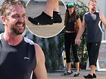 EXCLUSIVE TO INF. \nSeptember 26, 2015: Sweaty and barefoot Gerard Butler stays hydrated after a workout session with his designer girlfriend Morgan Brown in Los Angeles, CA. it is said that couples that workout together stay together.  They were also joined by Pro-volleyball star Gabrielle Reece.\nMandatory Credit: Sasha Lazic/INFphoto.com Ref.: infusla-257