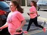 COLEEN THE YARD0227.jpg\nPREGNANT WAG COLEEN ROONEY MAKES A DASH FOR IT AS SHE LEAVES A JUICE SHOP IN ALDERLEY EDGE CHESHIRE, SOWING HER GROWING BABY BUMP IN A WILD THING T SHIRT