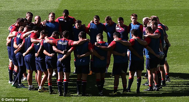 England gather together for a huddle in training at Twickenham on Friday ahead of the Wales clash