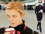 29.SEPTEMBER.2015 - LONDON - UK\n***EXCLUSIVE ALLROUND PICTURES***\nMODEL KARLIE KLOSS LOOKS A LITTLE TIRED AS SHE'S PICTURED PICKING UP A COFFEE WHILE ARRIVING AT HEATHROW AIRPORT IN LONDON.\nBYLINE MUST READ : XPOSUREPHOTOS.COM\n***UK CLIENTS - PICTURES CONTAINING CHILDREN PLEASE PIXELATE FACE PRIOR TO PUBLICATION***\nUK CLIENTS MUST CALL PRIOR TO TV OR ONLINE USAGE PLEASE TELEPHONE 0208 344 2007
