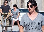 EXCLUSIVE TO INF. \nSeptember 27th, 2015: Sporting a 'Super Loved' print t-shirt, Shannon Doherty and husband Kurt Iswarienko grab groceries in preparation for Sunday night dinner in Malibu, CA.\nMandatory Credit:  SAA/Borisio/Lazic\nRef:infusla-301/277/257