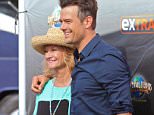 Universal City, CA - Josh Duhamel Brings Proud Mother Bonnie to Work and both stop to pose for photos, and Josh takes time to sign autographs for the fans.
.
AKM-GSI          September 28, 2015
To License These Photos, Please Contact :
Steve Ginsburg
(310) 505-8447
(323) 423-9397
steve@akmgsi.com
sales@akmgsi.com
or
Maria Buda
(917) 242-1505
mbuda@akmgsi.com
ginsburgspalyinc@gmail.com
