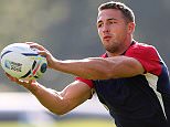 BAGSHOT, ENGLAND - SEPTEMBER 29:  Sam Burgess catches the ball during the England training session at Pennyhill Park on September 29, 2015 in Bagshot, England.  (Photo by David Rogers/Getty Images)
