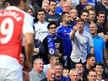 19 September 2015 - Barclays Premier League - Chelsea v Arsenal - A Chelsea fans shouts abuse and gestures at Santi Cazorla of Arsenal - Photo: Marc Atkins / Offside.