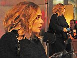 29 SEP 2015 - LONDON - UK\n*** EXCLUSIVE ALL ROUND PICTURES ***\nELUSIVE SINGER ADELE WHO IS RUMOURED TO BE RELEASING A NEW ALBUMN SOON WAS SPOTTED AT ROKA RESTAURANT. THE DIVA WORE ALL BLACK FOR THE OCCASION AND SEEMED TO HAVE A SCREENSAVER OF HER SON ANGELO ON HER PHONE, SHE DINED FOR 2 HOURS BUT HER PARTNER  SIMON WAS NOT PRESENT!\nBYLINE MUST READ : XPOSUREPHOTOS.COM\n***UK CLIENTS - PICTURES CONTAINING CHILDREN PLEASE PIXELATE FACE PRIOR TO PUBLICATION ***\n**UK CLIENTS MUST CALL PRIOR TO TV OR ONLINE USAGE PLEASE TELEPHONE   44 208 344 2007 **
