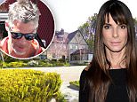 Here's a first look inside Sandra Bullock's spectacular Beverly Hills mansion. The Oscar-winning actress, 46, purchased the stunning $23million dollar property as the perfect place to start afresh. There is plenty of space for 'The Blind Side' star and adopted son, Louis, in the seven-bedroom, eight bathroom pad. Bullock split from her unfaithful husband, Jesse James, in 2010 following revelations the motoring mogul had cheated on America's sweetheart. "It will take her a year to remodel the mansion and get it just how she wants it," an insider said of the purchase. "It's a big project but when she's done it will be spectacular." The house offers panoramic views from downtown LA to the Pacific Ocean. The Tudor-style home also boasts massive windows for Sandra to admire the sprawling 4.1 acre grounds. The estate features its own private screening room, a master bedroom with dual bathrooms and a luxurious pool, where lucky Louis can learn to swim.....Pictured: Sandra Bullock's Beverly