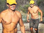 Orlando Bloom got some sun, playing in the sand with surfing legend Laird Hamilton, in Malibu, on Saturday, October 3, 2015 X17online.com
