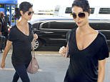 6.OCTOBER.2015 - LOS ANGELES - USA\n*AVAILABLE FOR UK SALE ONLY*\n** EXCLUSIVE ALL ROUND PICTURES **\nPREGNANT ACTRESS MORENA BACCARIN, FROM 'HOMELAND' AND 'GOTHAM', SHOWS OFF HER BABY BUMP AS SHE HEADS THROUGH LAX AIRPORT. MORENA WHO IS PREGNANT WITH GOTHAM COSTAR BEN MCKENZIE, IS CURRENTLY INVOLVED IN A MESSY DIVORCE FROM HUSBAND AUSTIN CHICK. MORENO HAS A SON WITH AUSTIN AND IS SAID TO BE ANXIOUS TO GET THE DIVORCE ORGANIZED QUICKLY SO SHE CAN MARRY BEN. NO RINGS CAN BE SEEN ON HER HAND AS SHE HEADED THRU THE AIRPORT.\nBYLINE MUST READ : XPOSUREPHOTOS.COM\n***UK CLIENTS - PICTURES CONTAINING CHILDREN PLEASE PIXELATE FACE PRIOR TO PUBLICATION ***\n*UK CLIENTS MUST CALL PRIOR TO TV OR ONLINE USAGE PLEASE TELEPHONE 0208 344 2007*