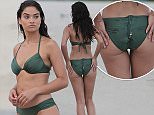 143326, EXCLUSIVE: Australian model Shanina Shaik shows off her stunning bikini body during a photo shoot in Miami. The 24 year old beauty wore several bikini's, a shirt dress and a jumpsuit during the beach shoot. Shaik worked for Victoria's Secret and Bonds and graced catwalks and magazine covers across the world. She's currently dating DJ Rukus. Miami, Florida - Monday October 05, 2015. Photograph: Brett Kaffee/Thibault Monnier, ¬© Pacific Coast News. Los Angeles Office: +1 310.822.0419 sales@pacificcoastnews.com FEE MUST BE AGREED PRIOR TO USAGE **AUSTRALIA OUT**