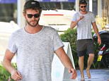 LIAM HEMSWORTH SPOTTED HEADING OUT FOR LUNCH IN HIS HOMETOWN ON PHILLIP ISLAND. BACK INTO THE LOCAL WAY OF THINGS, LIAM LOOKED SUPER CASUAL, WALKING BAREFOOT OUT OF A CAFE.\n8 October 2015\n©MEDIA-MODE.COM