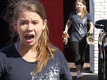 Hollywood, CA - DWTS contestant Bindi Irwin steps outside in socks and yelps in pain as she realizes how hot the pavement is.  The pretty blonde is ending a day of rehearsals as her mother, Terri, picks her up at practice. \nAKM-GSI        October 10, 2015\nTo License These Photos, Please Contact :\nSteve Ginsburg\n(310) 505-8447\n(323) 423-9397\nsteve@akmgsi.com\nsales@akmgsi.com\nor\nMaria Buda\n(917) 242-1505\nmbuda@akmgsi.com\nginsburgspalyinc@gmail.com