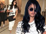 EXCLUSIVE: Selena Gomez looks stunning as she is spotted for the first time since reports that she had chemotherapy as a result of her Lupus diagnosis.  The adorable singer/actress/model was seen in a tight long dress & white heels while carrying her Louis Vuitton purse & her iPhone 6 as she was escorted to her gate by a bodyguard.  \n\nPictured: Selena Gomez\nRef: SPL1148244  091015   EXCLUSIVE\nPicture by: Sharky / Splash News\n\nSplash News and Pictures\nLos Angeles: 310-821-2666\nNew York: 212-619-2666\nLondon: 870-934-2666\nphotodesk@splashnews.com\n