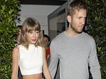 Taylor Swift and DJ Boyfriend Calvin Harris were all smiles as they left their romantic dinner at 'Giorgio Baldi' Italian Restaurant in Santa Monica, CA. Taylor was carrying a Pink designer handbag with a Cat's face on it....Pictured: Taylor Swift, Calvin Harris..Ref: SPL1098746  110815  ..Picture by: SPW / Splash News....Splash News and Pictures..Los Angeles: 310-821-2666..New York: 212-619-2666..London: 870-934-2666..photodesk@splashnews.com..
