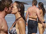 Picture Shows: Morgan Brown, Gerard Butler  October 12, 2015\n \n '300' actor Gerard Butler enjoys a day at the beach in Malibu, California with his girlfriend Morgan Brown and friends. The happy couple, who have been dating for over a year, were all smiles and packed on the PDA during the day of fun. \n \n Non Exclusive\n UK RIGHTS ONLY\n \n Pictures by : FameFlynet UK © 2015\n Tel : +44 (0)20 3551 5049\n Email : info@fameflynet.uk.com
