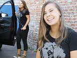 Hollywood, CA - Bindi Irwin arrives to the Dancing With the Stars studio after another perfect 10 performance on last night's show.  Bindi looked to be great spirits after last night's show and greeted her fans before walking into practice with her mom Terri.\nAKM-GSI       October 13, 2015\nTo License These Photos, Please Contact :\nSteve Ginsburg\n(310) 505-8447\n(323) 423-9397\nsteve@akmgsi.com\nsales@akmgsi.com\nor\nMaria Buda\n(917) 242-1505\nmbuda@akmgsi.com\nginsburgspalyinc@gmail.com