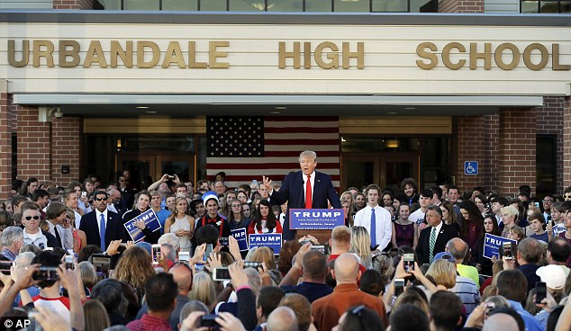 Absolutely; Donald Trump said that he would 'absolutely' consider appointing a Muslim-American to his Cabinet if he's elected president in 2016. Above he speaks at a rally in Urbandale, Iowa on Saturday