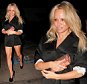 Actress Pamela Anderson sneaks out the back door of 'Craig's' restaurant in Los Angeles with two male friends. \n\nPictured: Pam Anderson\nRef: SPL1144660  081015  \nPicture by: Bello / SPW / Splash News\n\nSplash News and Pictures\nLos Angeles: 310-821-2666\nNew York: 212-619-2666\nLondon: 870-934-2666\nphotodesk@splashnews.com\n