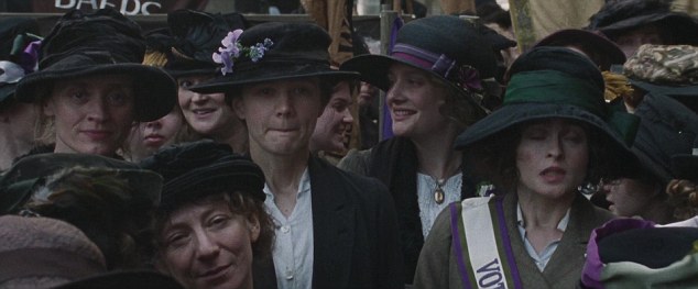 Women in arms: Violet (Anne-Marie Duff) and Maud (Carey Mulligan)  head to the House of Commons to join hundreds of women including Edith (Helena Bonham-Carter) and Alice (Romola Gari)