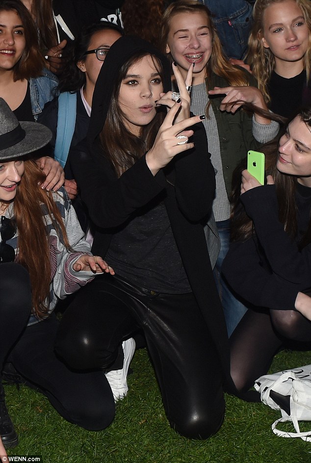 Strike a pose: Sophie got the giggles as Hailee pulled faces for the camera phones to the delight of their fans