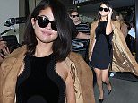 Los Angeles, CA - Selena Gomez shows some leg for her Los Angeles arrival at LAX. The sexy young actress and singer was returning from New York where she was promoting her latest song 'Good For You'.\n AKM-GSI    October 15, 2015\nTo License These Photos, Please Contact :\nSteve Ginsburg\n(310) 505-8447\n(323) 423-9397\nsteve@akmgsi.com\nsales@akmgsi.com\nor\nMaria Buda\n(917) 242-1505\nmbuda@akmgsi.com\nginsburgspalyinc@gmail.com