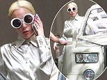 UK CLIENTS MUST CREDIT: AKM-GSI ONLY
EXCLUSIVE: West Hollywood, CA - Lady Gaga takes a call as she exits Chateau Marmont in West Hollywood with her bodyguards in a white Rolls Royce.

Pictured: Lady Gaga
Ref: SPL1152805  151015   EXCLUSIVE
Picture by: AKM-GSI / Splash News