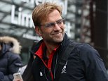 Jurgen Klopp is seen leading his players through Liverpool Lime Street train station. The German takes charge of his first game as Liverpool's manager tomorrow against Tottenham Hotspur, 16 October 2015.
16 October 2015.
Please byline: Peter Goddard/Vantagenews.com
