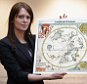 LONDON, ENGLAND - MARCH 25:  Head of European Prints, Severine Nackers holds a celestial Map of the Southern Sky by Albrecht Durer, at Sotheby's Auction House on March 25, 2011 in London, England. The two woodcut maps depicting the Northern and Southern skies circa 1515, are the earliest printed star charts of their kind ever published in Europe, and are expected to fetch between £120,000-180,000 GBP when they go on sale at the 'London sale of Old Master, Modern and Contemporary prints' at Sotheby's Auction house on March 30, 2011.  (Photo by Dan Kitwood/Getty Images)
