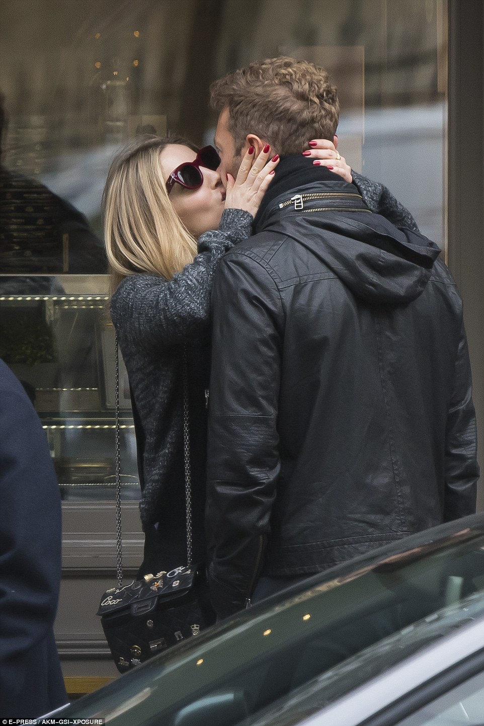 Locking lips: Appearing carefree as they stepped out in Le Marais district, the pair were inseparable as they soaked up the sights and enjoyed the ambience with an embrace