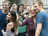 Hollywood, CA -  Nick Carter is all smiles as he takes a large amount of selfies with his fans as he arrives at the DWTS studio.  His partner, Sharna Burgess, looks quite amused as she heads in. \nAKM-GSI         October 16, 2015\nTo License These Photos, Please Contact :\nSteve Ginsburg\n(310) 505-8447\n(323) 423-9397\nsteve@akmgsi.com\nsales@akmgsi.com\nor\nMaria Buda\n(917) 242-1505\nmbuda@akmgsi.com\nginsburgspalyinc@gmail.com