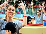 EXCLUSIVE: Celine Dion was spotted enjoying a day at Disneyland with her twin boys Nelson and Eddy Angelil. The trio were spotted taking a spin on the carousel, the teacups, and taking flight on Dumbo. The family spent a total of four days at the park, taking a break from her shows in Las Vegas.\n\nPictured:  Celine Dion, Nelson Angelil,  Eddy Angelil\nRef: SPL1135176  151015   EXCLUSIVE\nPicture by: Sharpshooter Images / Splash \n\nSplash News and Pictures\nLos Angeles: 310-821-2666\nNew York: 212-619-2666\nLondon: 870-934-2666\nphotodesk@splashnews.com\n
