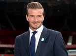 Former footballer David Beckham stands on the Old Trafford pitch to launch the upcoming UNICEF Match for Children, during a photocall at Old Trafford, Manchester. 

PRESS ASSOCIATION Photo. Picture date: Tuesday October 6, 2015. See PA story SOCCER Beckham. Photo credit should read: Martin Rickett/PA Wire.