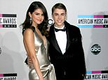 Mandatory Credit: Photo by Matt Baron/BEI/REX Shutterstock (1498642ds).. Selena Gomez and Justin Bieber.. American Music Awards, Arrivals, Los Angeles, America - 20 Nov 2011.. ..