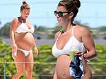 Coleen Rooney  in a white bikini gets her bump  out in the sun, is pictured on a catamaran in Barbados\n\nPictured: Coleen Rooney\nRef: SPL1155281  191015  \nPicture by: PRIMADONNA / Splash News\n\nSplash News and Pictures\nLos Angeles: 310-821-2666\nNew York: 212-619-2666\nLondon: 870-934-2666\nphotodesk@splashnews.com\n