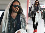 EXCLUSIVE:  Russell Brand is seen arriving at Perth Domestic Airport in Perth, Western Australia\n\nPictured: Russell Brand\nRef: SPL1154653  191015   EXCLUSIVE\nPicture by: Splash News\n\nSplash News and Pictures\nLos Angeles: 310-821-2666\nNew York: 212-619-2666\nLondon: 870-934-2666\nphotodesk@splashnews.com\n