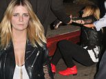 UK CLIENTS MUST CREDIT: AKM-GSI ONLY\nEXCLUSIVE: **SHOT ON 10/16/15** West Hollywood, CA - Mischa Barton takes a tumble at Chateau Marmont as she arrives with friends looking stylish with a black leather jacket, black skinny jeans with red boot accents.\n\nPictured: Mischa Barton\nRef: SPL1154315  171015   EXCLUSIVE\nPicture by: AKM-GSI / Splash News\n\n