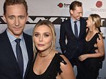 NASHVILLE, TN - OCTOBER 17:  Actor Tom Hiddleston, left, and actress Elizabeth Olsen attend the premiere of "I Saw The Light" at The Belcourt Theatre on October 17, 2015 in Nashville, Tennessee.  (Photo by John Shearer/Getty Images)