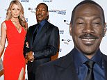 Eddie Murphy, his partner Paige Butcher, and mother Lillian Murphy arrive for the Mark Twain prize for Humor honoring Murphy at the Kennedy Center in Washington October 18, 2015.      REUTERS/Joshua Roberts