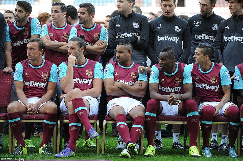 West Ham captain Mark Noble (from left to right), Andy Carroll, Payet, Diafra Sakho and Manuel Lanzini sit in the front row for the photo