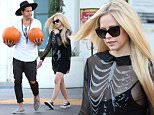 **EXCLUSIVE**  Date: October 20th 2015   Photo Credit: MOVI Inc.  For Usage Call: +1 310 739 4693\nOnly a month after announcing her split from  her last husband singer Avril Lavigne has been spotted seemingly very relaxed, almost too relaxed judging by her unfortunate waldrobe malfunction, with fellow rocker and notorious ladies man Ryan Cabrera. The pair seemed at ease with each other as they got into the Halloween spirit picking up some pumpkins from a Beverly Hills,Ca supermarket before being driven back to Lavigne's pad by an assistant. Lavigne was sporting a see through skeleton themed blouse with a tank top underneath which had slid down to reaveal a little too much.\n
