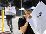 Picture Shows: Kourtney Kardashian  October 22, 2015\n \n Camera shy reality star Kourtney Kardashian enjoys some solo shopping in Beverly Hills, California. Kourtney was in no mood for photos and hid her face behind a shopping bag. \n \n Non Exclusive\n UK RIGHTS ONLY\n \n Pictures by : FameFlynet UK © 2015\n Tel : +44 (0)20 3551 5049\n Email : info@fameflynet.uk.com
