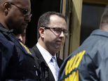 FILE - In this Aug. 19, 2015 file photo Former Subway restaurant spokesman Jared Fogle leaves the Federal Courthouse in Indianapolis following a hearing on child-pornography charges.  Ten victims of Fogle, who agreed to plead guilty to child pornography and sex-with-minors charges, have received the $100,000 in restitution he was ordered to pay each of them, and the remaining four should receive theirs before he is sentenced in the coming weeks. (AP Photo/Michael Conroy, file)