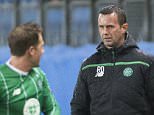 Celtic's manager Ronny Deila talks to his players during the Europa League Group A soccer match between Molde and Celtic at Aker Stadium in Molde, Norway, Thursday Oct. 22, 2015. (Svein Ove Ekornesvaag/NTB Scanpix via AP) NORWAY OUT