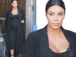 Picture Shows: Kim Kardashian  October 23, 2015\n \n Pregnant reality star Kim Kardashian is spotted at a production studio in Los Angeles, California. Kim, who recently celebrated her 35th birthday, showed off her huge baby bump in a tight black dress. \n \n Non Exclusive\n UK RIGHTS ONLY\n \n Pictures by : FameFlynet UK © 2015\n Tel : +44 (0)20 3551 5049\n Email : info@fameflynet.uk.com