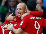 Bayern Munich's Arjen Robben (2nd R) celebrates with team mates after he scored against Cologne during their Bundesliga first division soccer match in Munich, Germany October 24, 2015.  REUTERS/Michael Dalder. DFL RULES TO LIMIT THE ONLINE USAGE DURING MATCH TIME TO 15 PICTURES PER GAME. IMAGE SEQUENCES TO SIMULATE VIDEO IS NOT ALLOWED AT ANY TIME. FOR FURTHER QUERIES PLEASE CONTACT DFL DIRECTLY AT + 49 69 650050